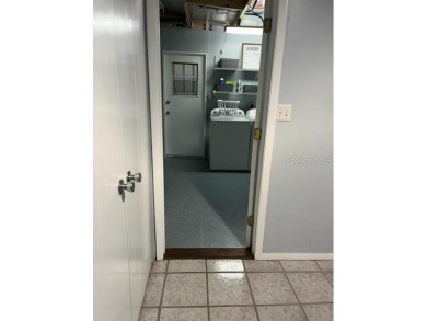 3 BEDROOM HOME - LIVE-IN OR OVERNIGHT CARE GIVER FRIENDLY - WITH on Fairway Village Golf Course in Florida - for sale on GolfHomes.com, golf home, golf lot