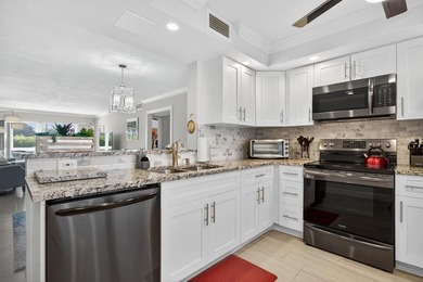 EXQUISITE 1ST FL DELUXE MODEL IN SOUGHT AFTER ARUBA VILLAGE ON on Wynmoor Golf Course in Florida - for sale on GolfHomes.com, golf home, golf lot