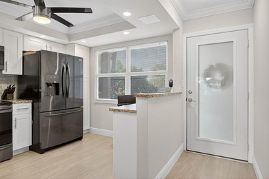 EXQUISITE 1ST FL DELUXE MODEL IN SOUGHT AFTER ARUBA VILLAGE ON on Wynmoor Golf Course in Florida - for sale on GolfHomes.com, golf home, golf lot