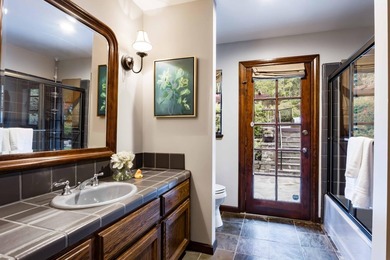 Shaded by towering redwoods and nestled beside the Palo Alto on Palo Alto Hills Golf and Country Club in California - for sale on GolfHomes.com, golf home, golf lot