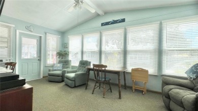 This stunning, partically furnished residence offers an inviting on Fairway Village Golf Course in Florida - for sale on GolfHomes.com, golf home, golf lot