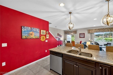 Come see this RARE end unit town home with exceptional lake AND on Gateway Golf and Country Club in Florida - for sale on GolfHomes.com, golf home, golf lot