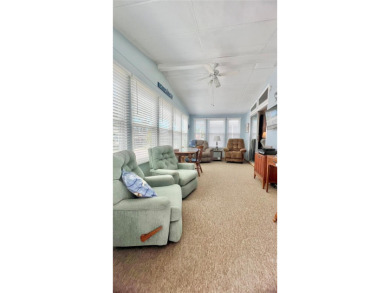 This stunning, partically furnished residence offers an inviting on Fairway Village Golf Course in Florida - for sale on GolfHomes.com, golf home, golf lot
