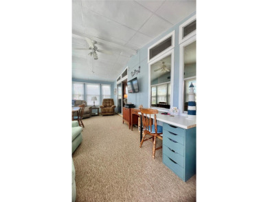 This stunning, partically furnished residence offers an inviting on Fairway Village Golf Course in Florida - for sale on GolfHomes.com, golf home, golf lot