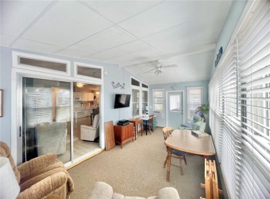 This stunning, partically furnished residence offers an inviting on Fairway Village Golf Course in Florida - for sale on GolfHomes.com, golf home, golf lot