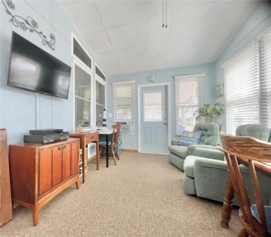 This stunning, partically furnished residence offers an inviting on Fairway Village Golf Course in Florida - for sale on GolfHomes.com, golf home, golf lot