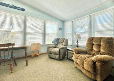 This stunning, partically furnished residence offers an inviting on Fairway Village Golf Course in Florida - for sale on GolfHomes.com, golf home, golf lot