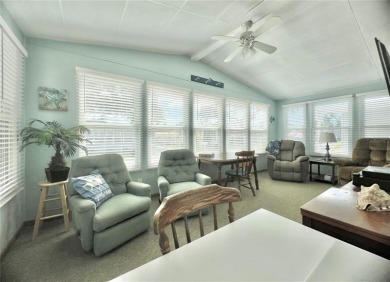 This stunning, partically furnished residence offers an inviting on Fairway Village Golf Course in Florida - for sale on GolfHomes.com, golf home, golf lot
