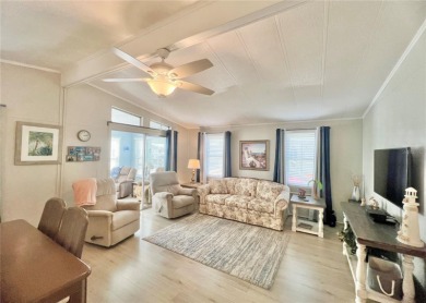 This stunning, partically furnished residence offers an inviting on Fairway Village Golf Course in Florida - for sale on GolfHomes.com, golf home, golf lot