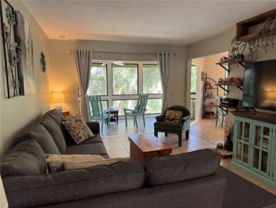 Move in Ready Condominium offering Confort, style, and on Palm Harbor Golf Club in Florida - for sale on GolfHomes.com, golf home, golf lot