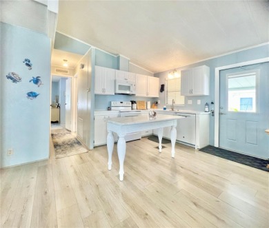 This stunning, partically furnished residence offers an inviting on Fairway Village Golf Course in Florida - for sale on GolfHomes.com, golf home, golf lot