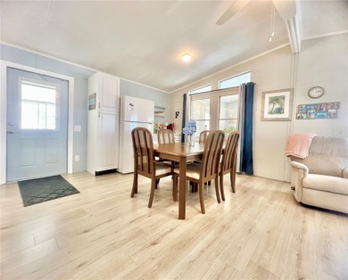 This stunning, partically furnished residence offers an inviting on Fairway Village Golf Course in Florida - for sale on GolfHomes.com, golf home, golf lot