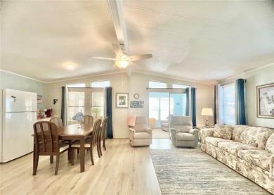 This stunning, partically furnished residence offers an inviting on Fairway Village Golf Course in Florida - for sale on GolfHomes.com, golf home, golf lot