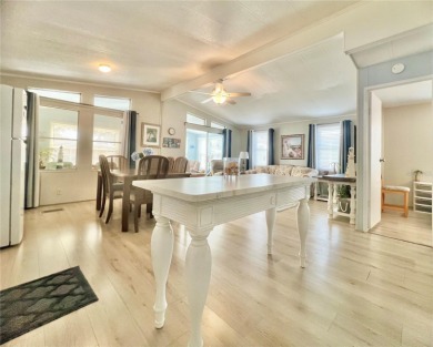 This stunning, partically furnished residence offers an inviting on Fairway Village Golf Course in Florida - for sale on GolfHomes.com, golf home, golf lot