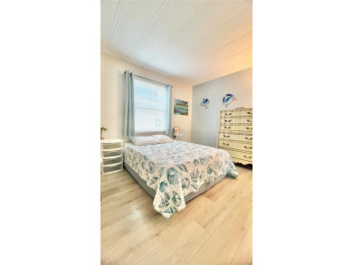 This stunning, partically furnished residence offers an inviting on Fairway Village Golf Course in Florida - for sale on GolfHomes.com, golf home, golf lot