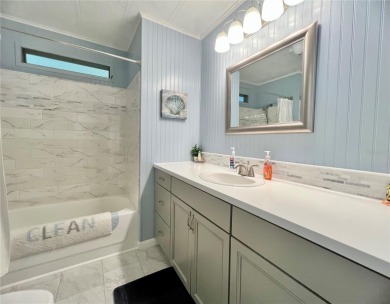 This stunning, partically furnished residence offers an inviting on Fairway Village Golf Course in Florida - for sale on GolfHomes.com, golf home, golf lot