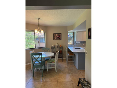 Move in Ready Condominium offering Confort, style, and on Palm Harbor Golf Club in Florida - for sale on GolfHomes.com, golf home, golf lot