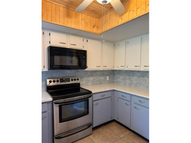 Move in Ready Condominium offering Confort, style, and on Palm Harbor Golf Club in Florida - for sale on GolfHomes.com, golf home, golf lot
