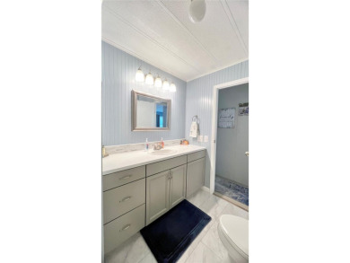 This stunning, partically furnished residence offers an inviting on Fairway Village Golf Course in Florida - for sale on GolfHomes.com, golf home, golf lot