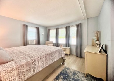 This stunning, partically furnished residence offers an inviting on Fairway Village Golf Course in Florida - for sale on GolfHomes.com, golf home, golf lot