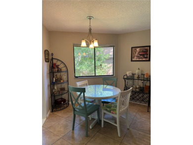 Move in Ready Condominium offering Confort, style, and on Palm Harbor Golf Club in Florida - for sale on GolfHomes.com, golf home, golf lot