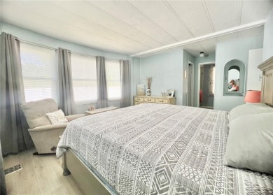 This stunning, partically furnished residence offers an inviting on Fairway Village Golf Course in Florida - for sale on GolfHomes.com, golf home, golf lot
