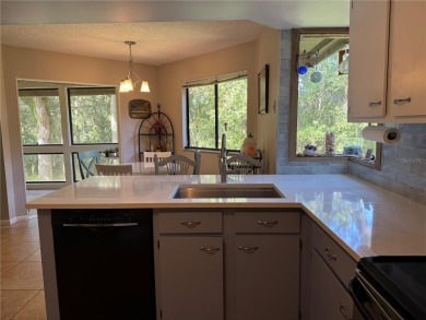 Move in Ready Condominium offering Confort, style, and on Palm Harbor Golf Club in Florida - for sale on GolfHomes.com, golf home, golf lot