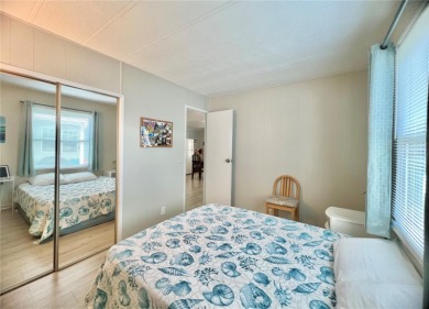 This stunning, partically furnished residence offers an inviting on Fairway Village Golf Course in Florida - for sale on GolfHomes.com, golf home, golf lot