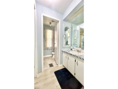 This stunning, partically furnished residence offers an inviting on Fairway Village Golf Course in Florida - for sale on GolfHomes.com, golf home, golf lot