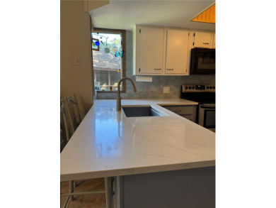 Move in Ready Condominium offering Confort, style, and on Palm Harbor Golf Club in Florida - for sale on GolfHomes.com, golf home, golf lot