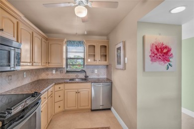 Excellent opportunity to live in the beautiful Palms Tower. This on Deer Creek Golf Club in Florida - for sale on GolfHomes.com, golf home, golf lot