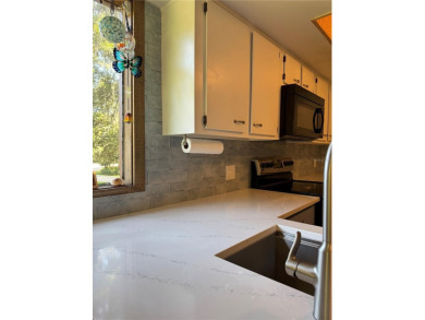 Move in Ready Condominium offering Confort, style, and on Palm Harbor Golf Club in Florida - for sale on GolfHomes.com, golf home, golf lot
