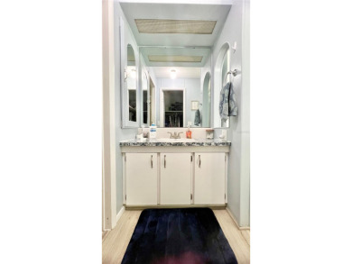 This stunning, partically furnished residence offers an inviting on Fairway Village Golf Course in Florida - for sale on GolfHomes.com, golf home, golf lot