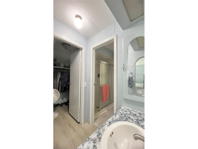 This stunning, partically furnished residence offers an inviting on Fairway Village Golf Course in Florida - for sale on GolfHomes.com, golf home, golf lot