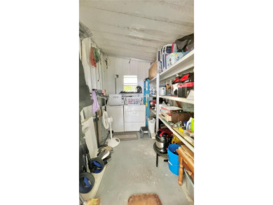 This stunning, partically furnished residence offers an inviting on Fairway Village Golf Course in Florida - for sale on GolfHomes.com, golf home, golf lot