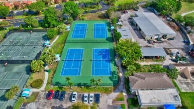 Welcome to your dream home in the prestigious, guard-gated on Indian Spring Golf and Country Club in Florida - for sale on GolfHomes.com, golf home, golf lot