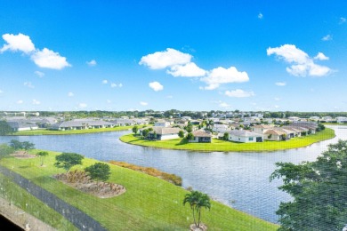 Corner waterfront unit with beautiful lakefront views.  Features on Marina Lakes Golf Course in Florida - for sale on GolfHomes.com, golf home, golf lot