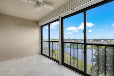 Corner waterfront unit with beautiful lakefront views.  Features on Marina Lakes Golf Course in Florida - for sale on GolfHomes.com, golf home, golf lot