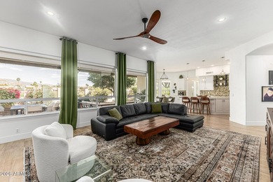 Beautifully remodeled home offering spectacular mountain views on The Foothills Golf Club in Arizona - for sale on GolfHomes.com, golf home, golf lot