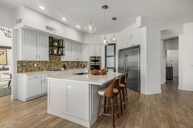 Beautifully remodeled home offering spectacular mountain views on The Foothills Golf Club in Arizona - for sale on GolfHomes.com, golf home, golf lot