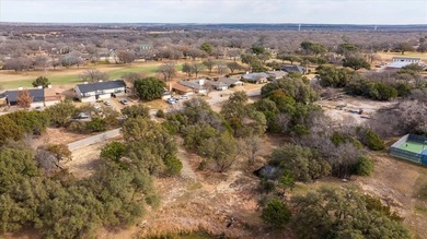 Discover the perfect opportunity to build in the highly on Pecan Plantation Country Club in Texas - for sale on GolfHomes.com, golf home, golf lot