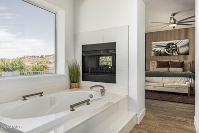 Beautifully remodeled home offering spectacular mountain views on The Foothills Golf Club in Arizona - for sale on GolfHomes.com, golf home, golf lot