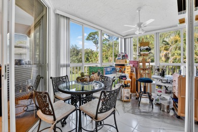 GORGEOUS CONDO WITH DESIREABLE WEST EXPOSURE , BEAUTIFULLY on Boca West Golf and Country Club in Florida - for sale on GolfHomes.com, golf home, golf lot