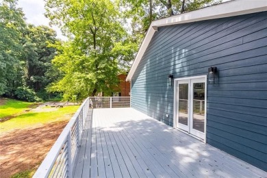 Step into modern elegance at this designer-renovated East Lake on East Lake Golf Club in Georgia - for sale on GolfHomes.com, golf home, golf lot