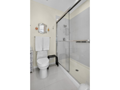 GORGEOUS CONDO WITH DESIREABLE WEST EXPOSURE , BEAUTIFULLY on Boca West Golf and Country Club in Florida - for sale on GolfHomes.com, golf home, golf lot