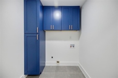 Step into modern elegance at this designer-renovated East Lake on East Lake Golf Club in Georgia - for sale on GolfHomes.com, golf home, golf lot