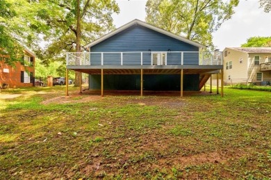 Step into modern elegance at this designer-renovated East Lake on East Lake Golf Club in Georgia - for sale on GolfHomes.com, golf home, golf lot