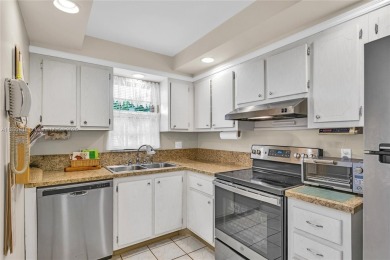 Beautiful 2 bed 2 bath unit in The Palms of Deer Creek located on Deer Creek Golf Club in Florida - for sale on GolfHomes.com, golf home, golf lot