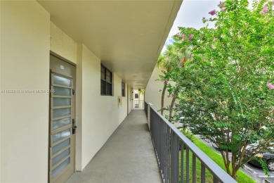 Beautiful 2 bed 2 bath unit in The Palms of Deer Creek located on Deer Creek Golf Club in Florida - for sale on GolfHomes.com, golf home, golf lot