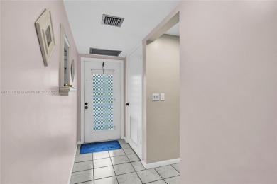 Beautiful 2 bed 2 bath unit in The Palms of Deer Creek located on Deer Creek Golf Club in Florida - for sale on GolfHomes.com, golf home, golf lot